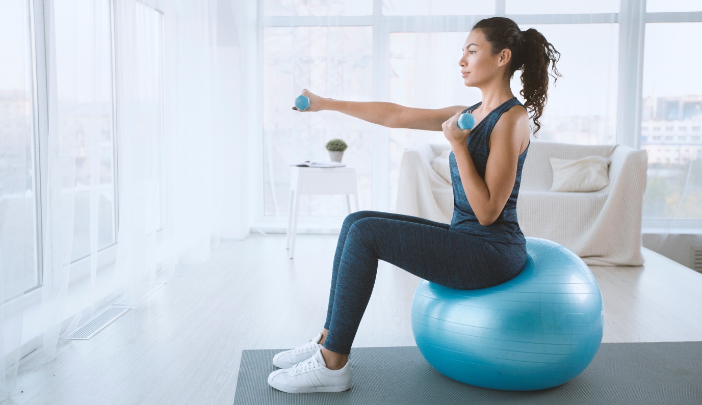 woman exercising at home